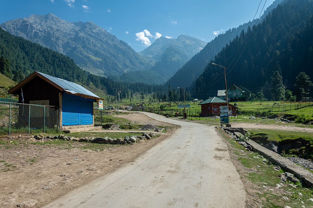 Alpine meadows and wooden cottages in Aru Valley Kashmir