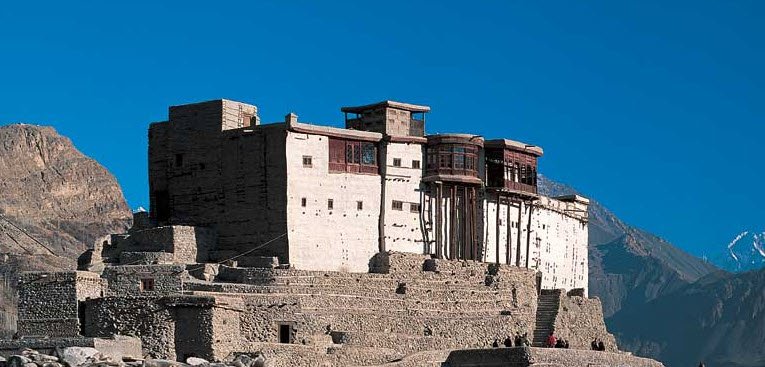 Baltit Fort with dramatic mountain backdrop in Karimabad, Hunza