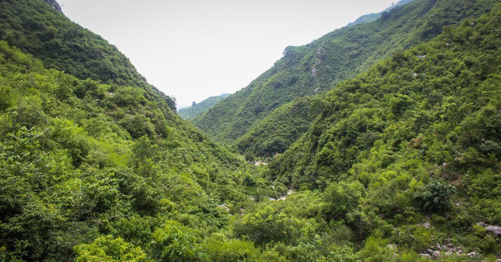 Scenic view of Margalla Hills behind Golra Sharif Pakistan shrine and railway station