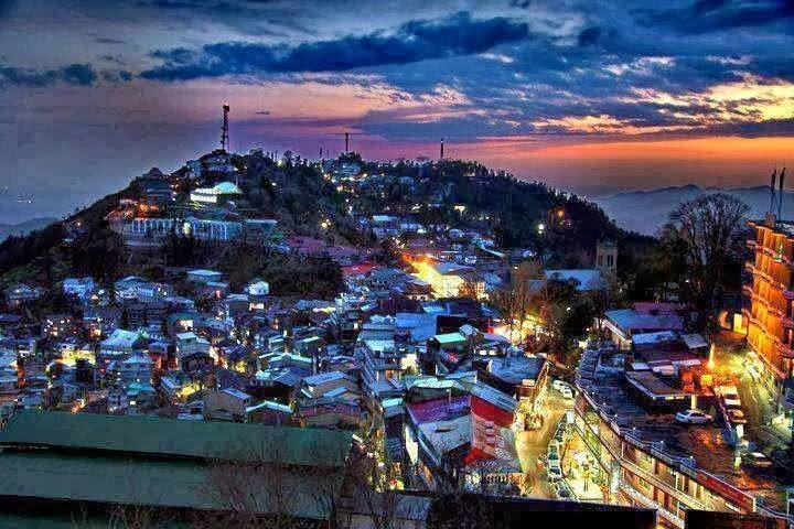 Panoramic view of Murree with colonial buildings and surrounding mountains.History of Murree
