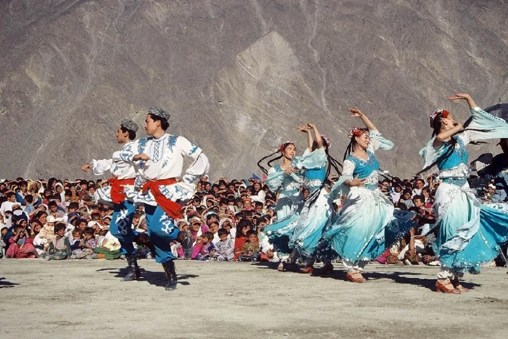 Local people in colorful traditional dress during Hunza cultural event