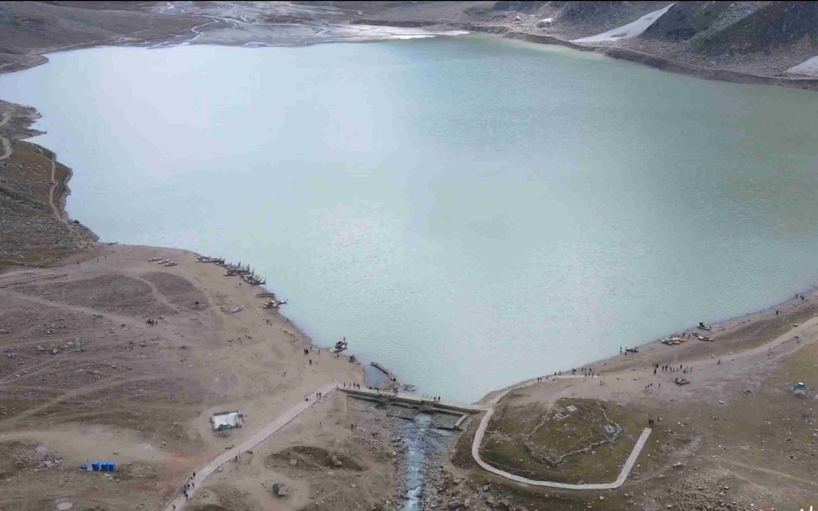 Aerial photograph of Jheel Saif ul Malook with Malika Parbat in the background during summer